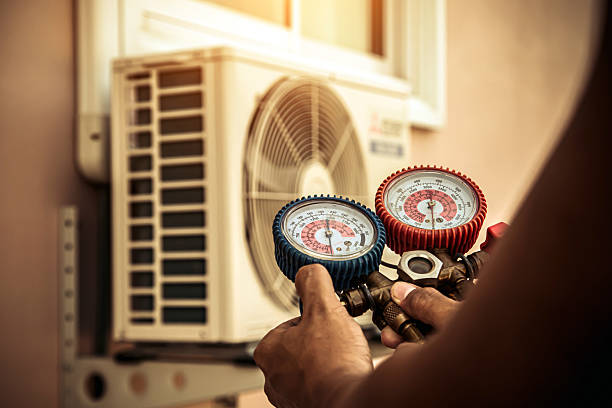 Professional Ac Installation technician working in Westphalia, IN